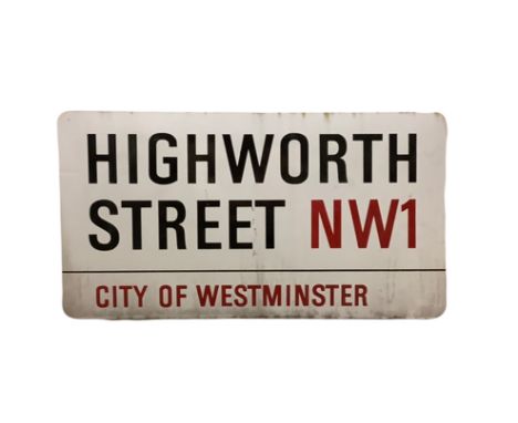 An enamelled steel street sign for Highworth Street NW1, City of Westminster with iconic black and red sans serif lettering f
