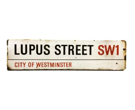 An enamelled steel street sign for Lupus Street SW1, City of Westminster with iconic black and red sans serif lettering first