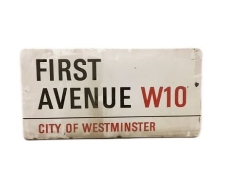 An enamelled steel street sign for First Avenue W10, City of Westminster with iconic black and red sans serif lettering first