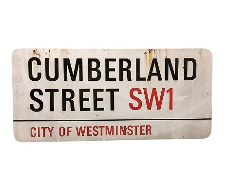 An enamelled steel street sign for Cumberland Street SW1 City of Westminster with iconic black and red sans serif lettering f