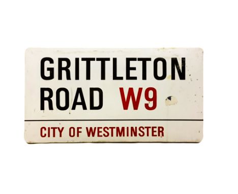 An enamelled steel street sign for Grittleton Road W9, City of Westminster with iconic black and red sans serif lettering fir