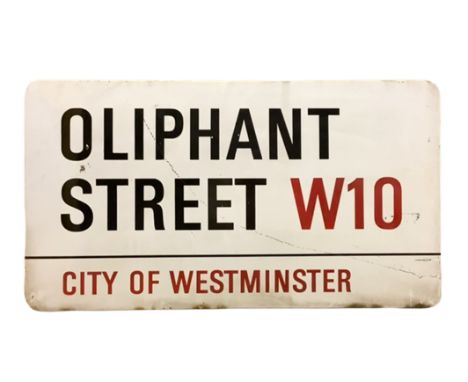 An enamelled steel street sign for Oliphant Street W10, City of Westminster with iconic black and red sans serif lettering fi