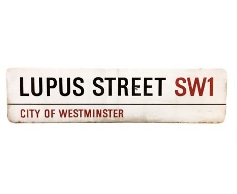An enamelled steel street sign for Lupus Street SW1, City of Westminster with iconic black and red sans serif lettering first