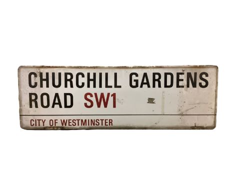 An enamelled steel street sign for Churchill Gardens Road SW1, City of Westminster with iconic black and red sans serif lette