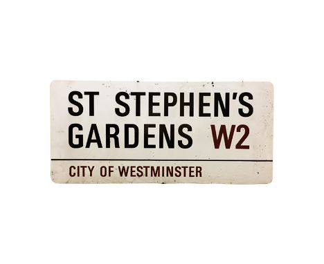 An enamelled steel street sign for St. Stephen's Gardens W2, City of Westminster with iconic black and red sans serif letteri