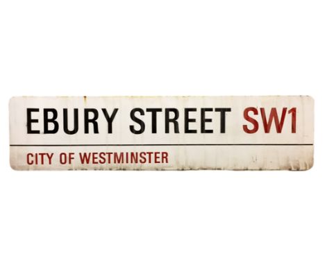 An enamelled steel street sign for Ebury Street Sw1, City of Westminster with iconic black and red sans serif lettering first