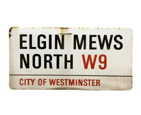 An enamelled steel street sign for Elgin Mews North W9, City of Westminster with iconic black and red sans serif lettering fi