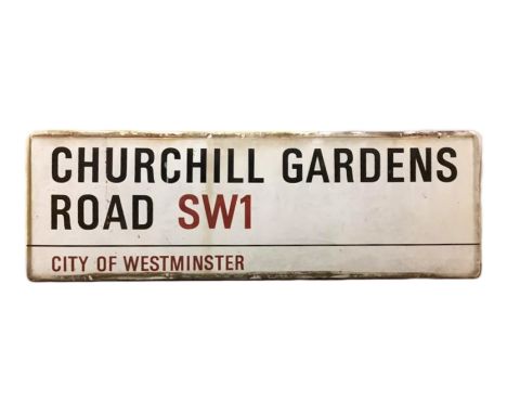 An enamelled steel street sign for Chiurchill Gardens Road SW1, City of Westminster with iconic black and red sans serif lett