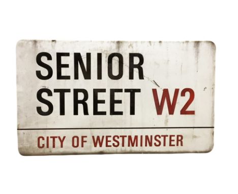 An enamelled steel street sign for Senior Street W2, City of Westminster with iconic black and red sans serif lettering first