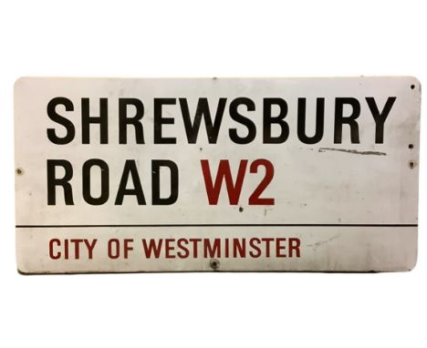 An enamelled steel street sign for Shrewsbury Road W2, City of Westminster with iconic black and red sans serif lettering fir