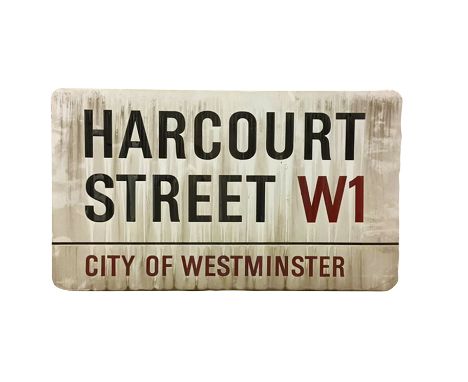 An enamelled steel street sign for Harcourt Street SW1, City of Westminster with iconic black and red sans serif lettering fi
