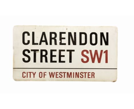 An enamelled steel street sign for Clarendon Street SW1, City of Westminster with iconic black and red sans serif lettering f