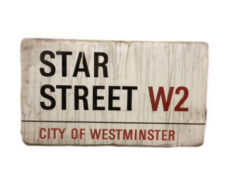 An enamelled steel street sign for Star Street W2, City of Westminster with iconic black and red sans serif lettering first c