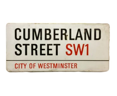 An enamelled steel street sign for Cumberland Street SW1, City of Westminster with iconic black and red sans serif lettering 