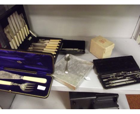 Collection of flatware and others to include a silver spoon