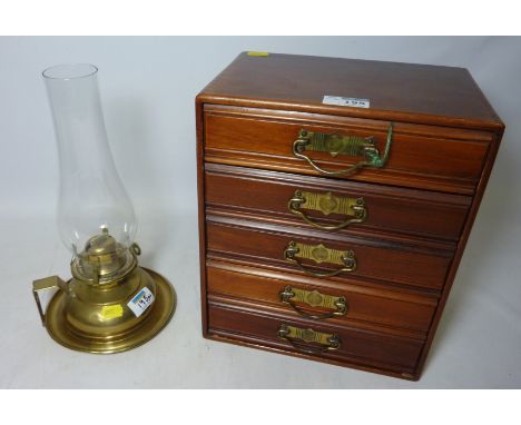 Early 20th Century walnut five drawer chest H 31 cm and a brass oil lamp  Condition Report Click here for further images, con