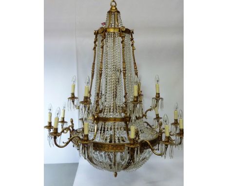 Large mid 20th century gilt metal and cut glass chandelier, basket design with upper six branches and lower six twin branches