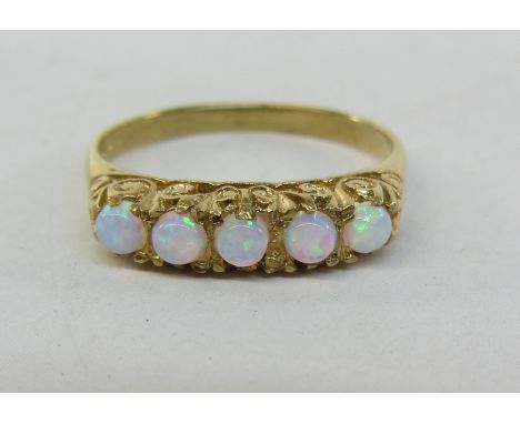 Five stone opal gilt ring stamped SIL Condition Report Click here for further images, condition, auction times & delivery cos