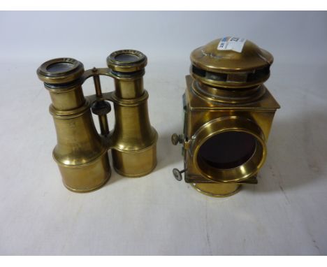 Early 20th century Imperial Motor Industries brass car lamp and a pair of brass 'The Liverpool' binoculars retailed by W H Mo