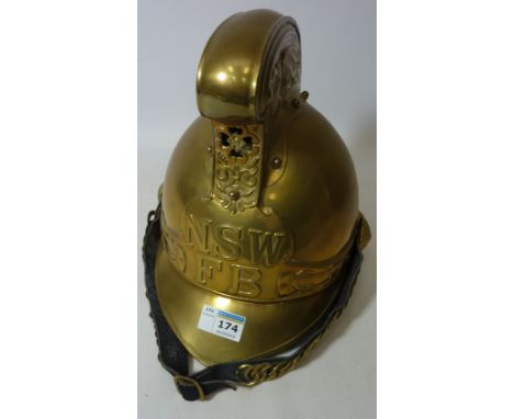 Reproduction brass 'NSW' Fire Brigade helmet  Condition Report Click here for further images, condition, auction times & deli