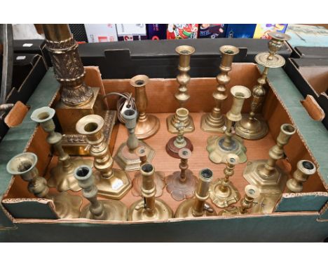 A large brass pillar table-lamp to/w nineteen various antique and other brass candlesticks (box) 