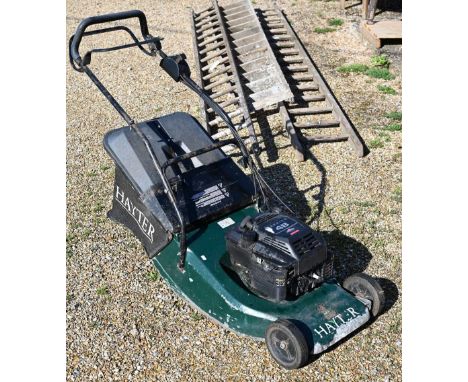 A Hayter Harrier 48 petrol lawn mower with Briggs &amp; Stratton engine c/w grass box (a/f) 