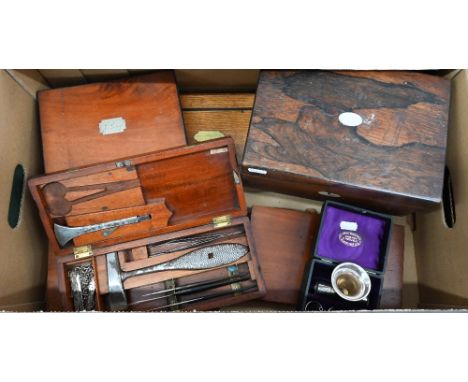 A 19th century brass-bound mahogany case containing a part set of surgical instruments from Millikin &amp; Lawley, Strand, Lo