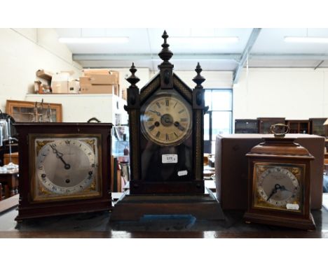 A boxed Garrards retailed mantel clock (1980) to/w a Mappin &amp; Webb retailed clock and an American mantel clock (3) 