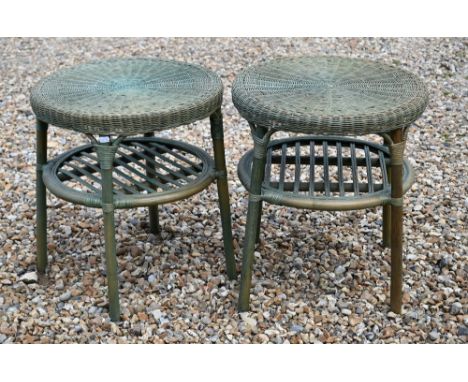A pair of painted circular cane and wicker two-tier lamp tables, 50 cm diam x 55 cm high (2) 