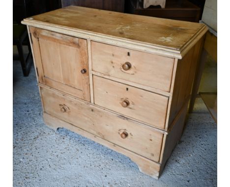 A vintage pine chest with panelled cupboard and three drawers on bracket fee, 96 x 45 x 82 cm high 