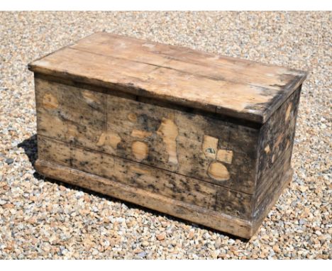 An old weathered and stained pine trunk, the interior with side drawer, 105 cm x 56 cm x 56 cm h