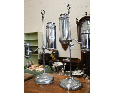 Two chrome adjustable oil lamps f/r 