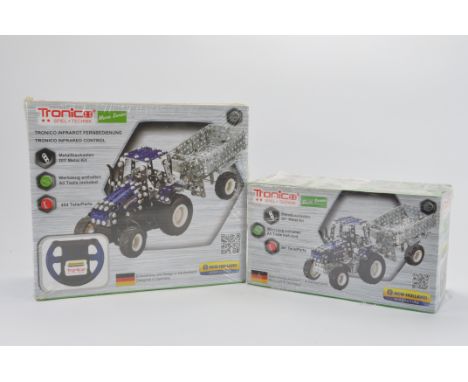 Pair of Tronico Tractor based Metal Kits including New Holland issues. As New. (2)