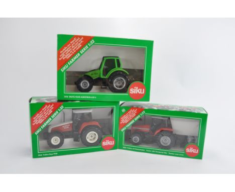 Siku Tractor Trio including Deutz, Steyr and Massey Ferguson. NM to M in E Boxes. (3)