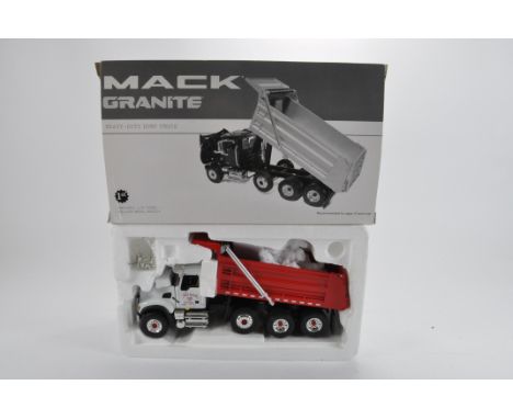 First Gear 1/34 Scale Mack Granite Dump Truck - Faust Hauling. NM to M in VG Box.