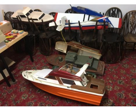 Interesting Group of Large Scale Remote Control themed Model Boats and Aircraft and other vehicles. From a single Vendor. Man