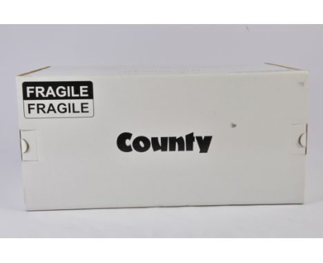 Universal Hobbies 1/16 County Super Four Tractor. Last off the line. M in E Box.