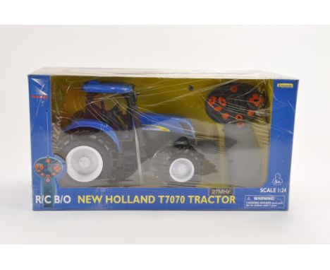 New Ray 1/24 Scale RC New Holland Tractor. M in E Box.