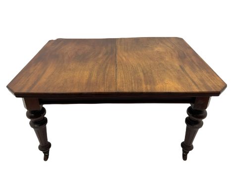 Late Victorian mahogany telescopic extending dining table, canted rectangular top with two additional leaves, turned tapering