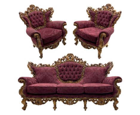 Late 20th century Italian style carved beech framed three seat sofa and pair matching armchairs, the framed carved and pierce