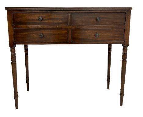 Georgian design mahogany side table, the moulded top over two short and one long drawer, raised on turned supportsDimensions: