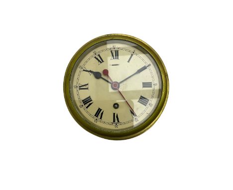 A 20th century eight-day English brass cased bulkhead clock, with a 6” painted dial, roman numerals with Arabic five-minutes 