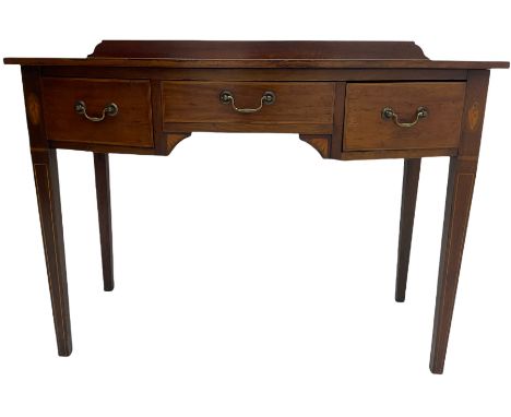 Edwardian mahogany dressing side table, raised back on bow front top with satinwood band, fitted with three drawers, inlaid w