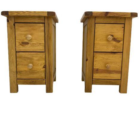Pair of pine two drawer bedside lamp chestsDimensions: Height:&nbsp;56cm&nbsp; Length/Width:&nbsp;35cm&nbsp; Depth/Diameter:&