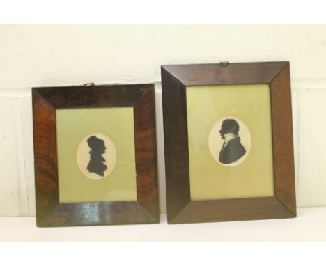 19th century hand-painted silhouette portrait of a gentleman, heightened with white, 7.5cm x 6.5cm (oval) in rosewood frame, 