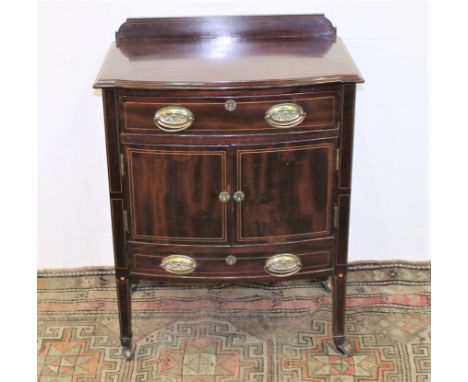 Edwardian mahogany inlaid bow front commode, frieze drawer & pair panel door cupboards below, on square supports, 64cm.