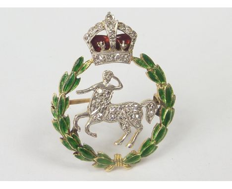 Gold and enamel sweetheart style brooch with diamond set centaur with crown and wreath, "15ct pt".