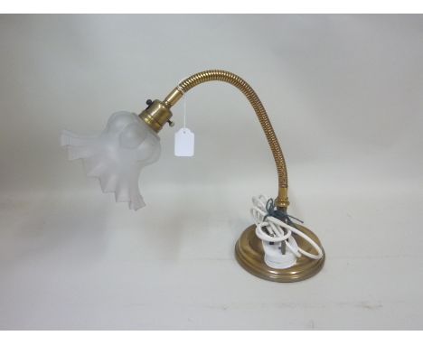Early 20th century brass desk lamp the adjustable column on circular base with frosted flared glass shade, 56cm fully extende
