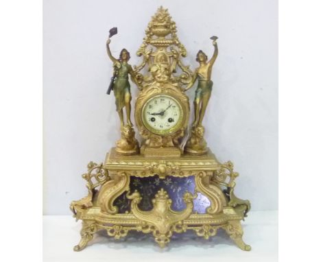 Late 19th century French  spelter mantel clock, white enamel dial with Arabic numerals in ornate case, with pierced vase back