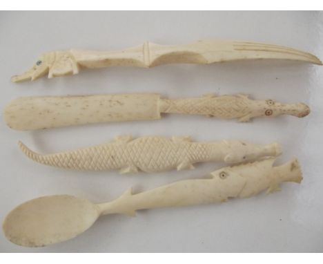 Four items of bone, spoon, knife, fork etc 